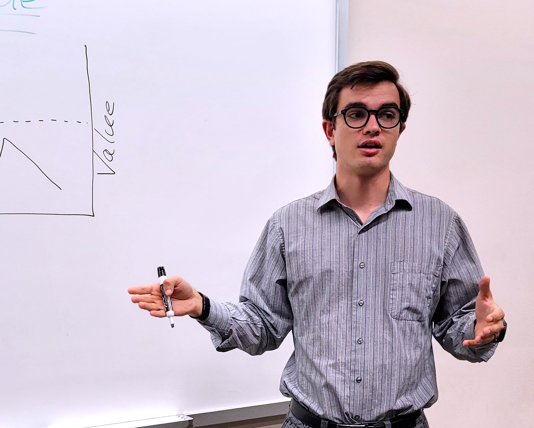 Math instructor teaching a class